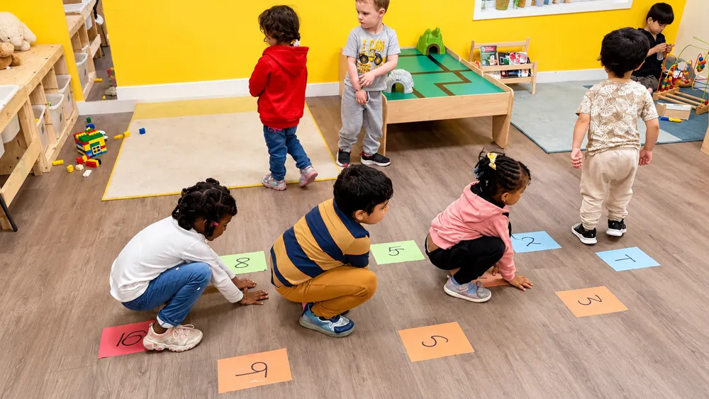 Children participating in a learning activity at daycare